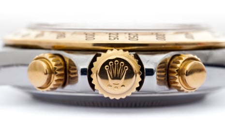 The winding crown of a Rolex watch
