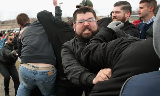 Heimbach fights with demonstrators at Michigan State University, where the speech by Spencer turned chaotic.