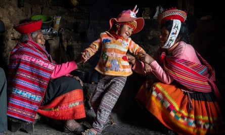 Fortunata Pfuturi, who is aged about 90, at home in Rukha, Cuzco region, with her daughter Dora and her granddaughter.