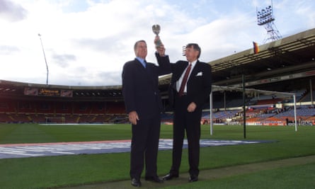 Geoff Hurst, left, with Martin Peters with a replica of the World Cup trophy commemorating the ‘old’ Wembley stadium on the eve of the final game there in 2004.