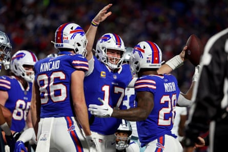 Josh Allen of the Buffalo Bills celebrates after his rushing touchdown during the second quarter against the Dallas Cowboys at Highmark Stadium on Sunday.