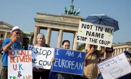 Protesters in front of the Brandenburg Gate in Berlin on Saturday