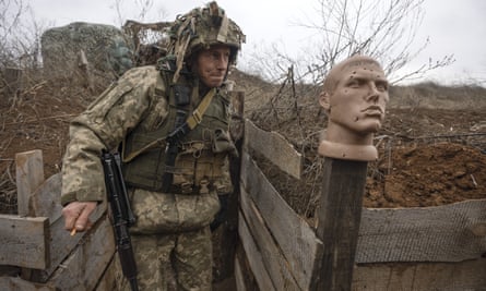 A Ukrainian soldier at the line of separation from pro-Russian rebels in the Donetsk region on Sunday.