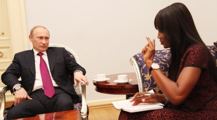 Naomi Campbell with Vladimir Putin at the Tiger Summit in St Petersburg in 2010