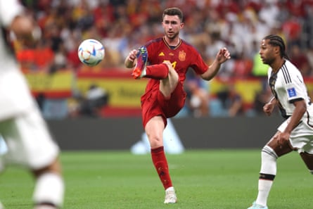 Spain’s Aymeric Laporte passes the ball against Germany