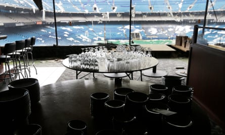 Glassware is set-up for auction inside the Silverdome in an effort to raise funds