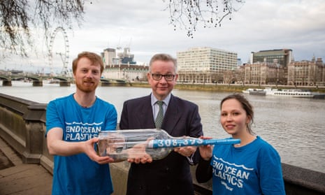 The environment secretary, Michael Gove, is handed a petition of more than 300,000 signatures calling for a bottle deposit return scheme.