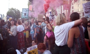 Demonstrators gather outside Downing Street in London