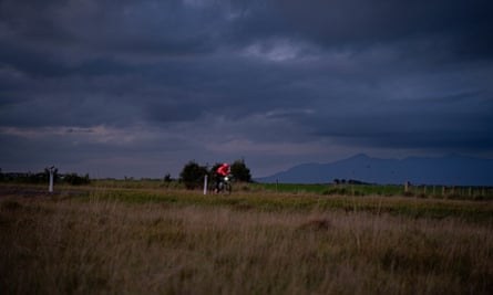 Lachlan Morton riding on country road