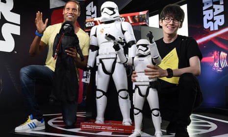 US model Dante Carver, left, and YouTuber Einshine introduce three new types of Star Wars figures during a live YouTube event in Tokyo.