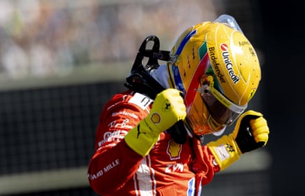 Lewis Hamilton clenches his fists in delight
