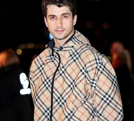 Reece Clarke poses as he arrives for the Burberry catwalk show during London Fashion Week, in London, Britain, February 24, 2025.