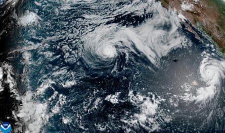 This satellite image shows Hurricane Genevieve swirling off the south-west coast of Mexico, over the Pacific Ocean, on 26 July.