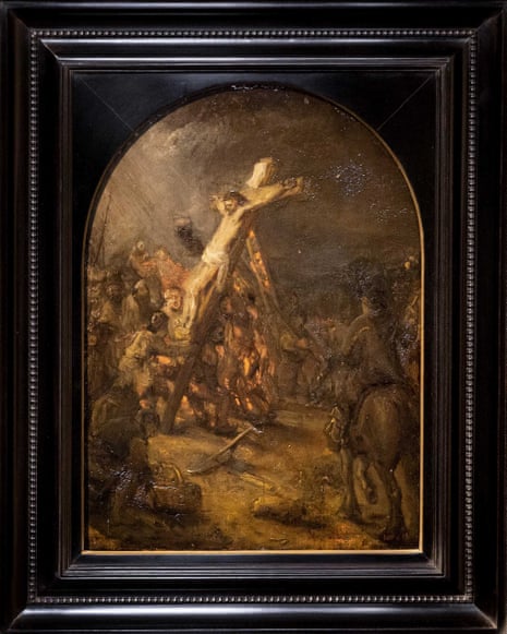 Oil painting in frame showing the cross carrying Jesus being by a crowd of people. The painting is mostly dark with dramatic light from the top left falling on the figure of Jesus
