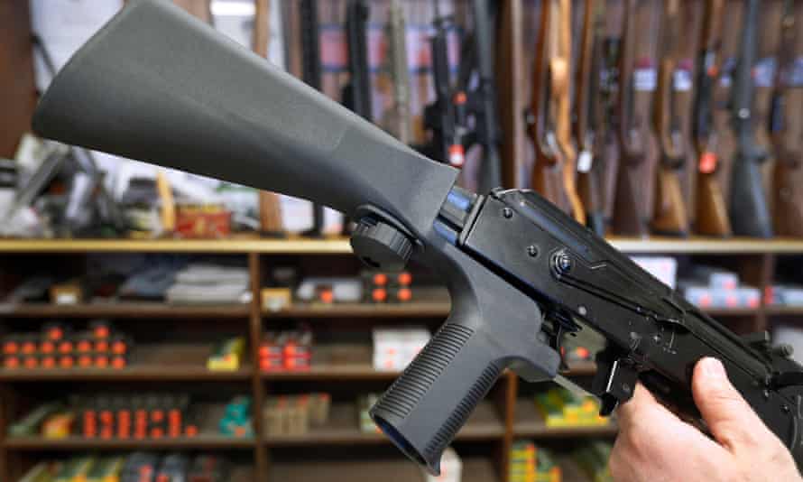A bump stock device that fits on a semi-automatic rifle to increase the firing speed, making it similar to a fully automatic rifle.