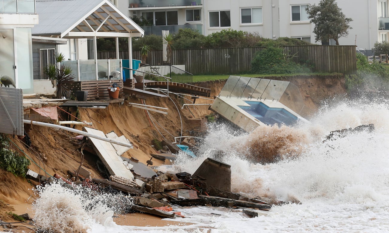 Waves crash against a swimming pool that was washed away from a property on the Collaroy beachfront after heavy storms battered Sydney’s beaches.