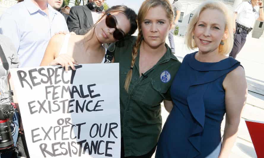 Comedian Amy Schumer (centre) protests against Brett Kavanaugh’s nomination to the supreme court.