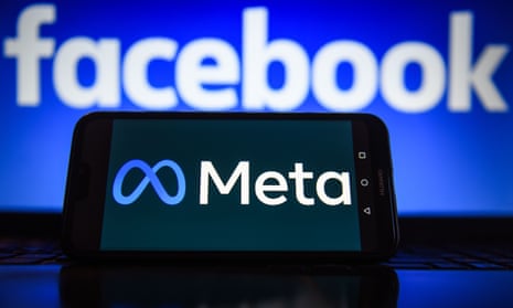 A Meta logo is displayed on a smartphone with the Facebook logo in the background.