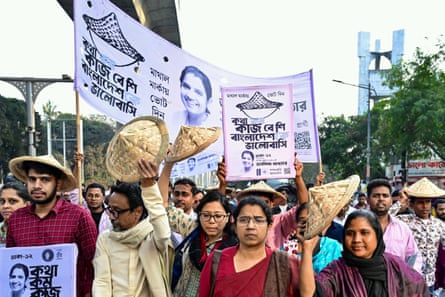 People holding placards at an election rally