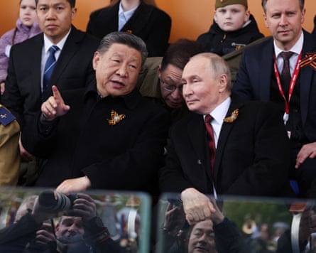 Vladimir Putin and Chinese President Xi Jinping attend the Victory Day military parade at Red Square in central Moscow on 9 May 2025.