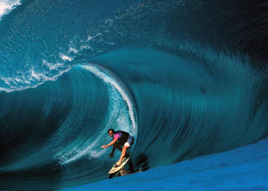 Riding giants: Laird Hamilton surfs Teahupoo in Tahiti.