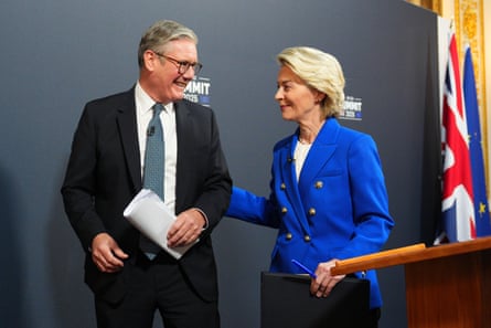 Keir Starmer and Ursula von der Leyen smiling at one another as they leave the stage of a press conference