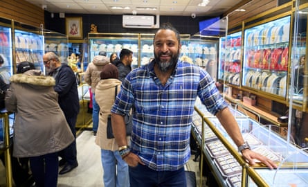 Sundeep Kanda, the owner of Sunny Jewellers, standing in his shop.