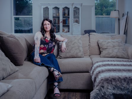 Shauna Castaner sitting on a beige sofa with beige cushions scattered on it