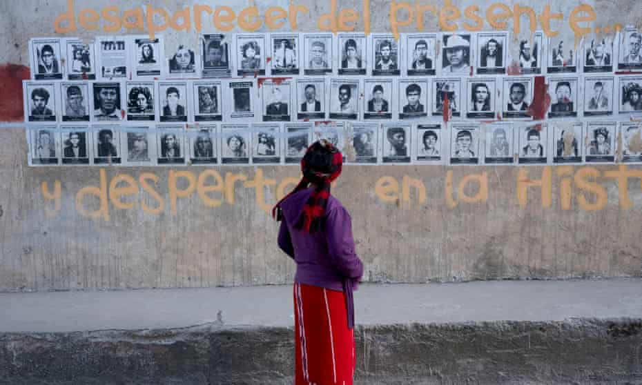 Pictures of disappeared civilians on a wall in Nebaj, Guatemala. More than 40,000 people were forcefully disappeared during Guatemala’s long civil war.