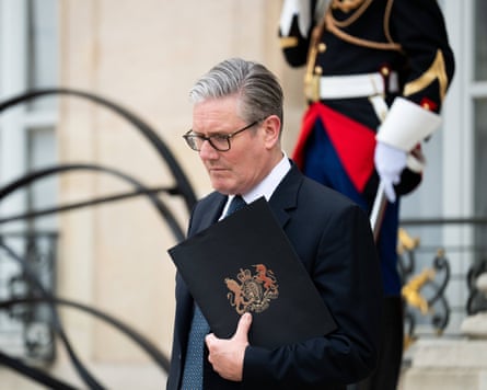 Keir Starmer leaves after a joint statement following an international summit on efforts to reopen the strait of Hormuz in Paris