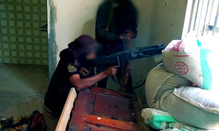 An al-Qaida in the Arabian Peninsula fighter using an MG3 machine gun in Taiz, south-west Yemen, in January 2016