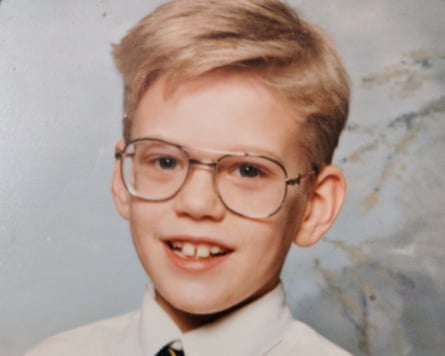 Looking back … Stuart Heritage, eight, with his ‘jam jar’ glasses.