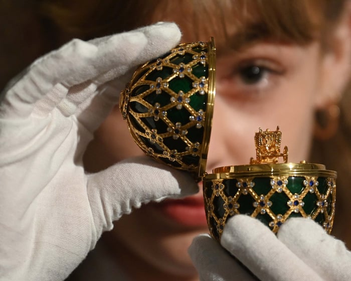 Oil and gold prices retreat on Ukraine optimism; Fabergé sold to US investment firm – business live