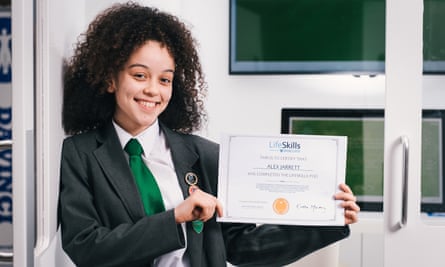 Alex Jarrett, a year 11 student at Lister Community school, with her certificate