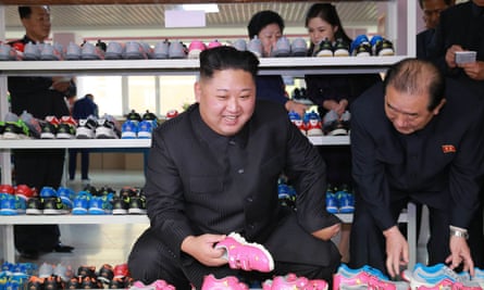 Kim during a recent visit to the Ryuwon shoe factory in Pyongyang.