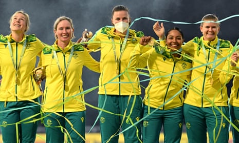 Tahlia McGrath is seen as she and her Australia teammates celebrate winning T20 cricket gold at Edgbaston.