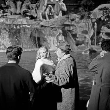 Anita Ekberg and Federico Fellini on the set of the fountain scene in La Dolce Vita in 1959