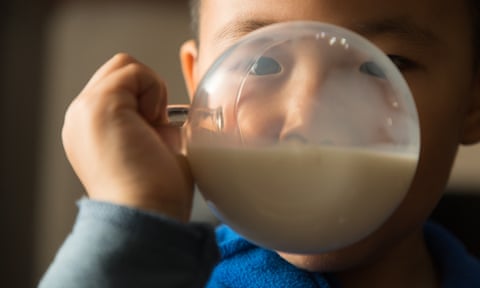 A five-year-old boy drinks milk at home in Beijing, China