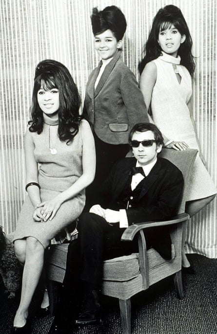 ‘Give them a tambourine!’ . . . Ronnie Spector, sitting on the arm of the chair, was married to Phil Spector, seated, from 1968 to 74.