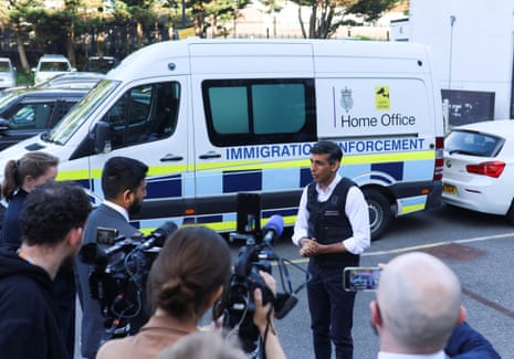 Rishi Sunak watching an immigration raid in north-west London this morning.