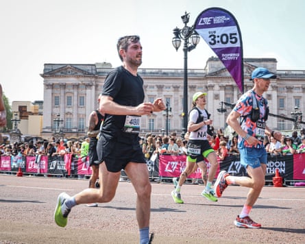 Charlie Allenby, pictured left, running the London Marathon in 2025.