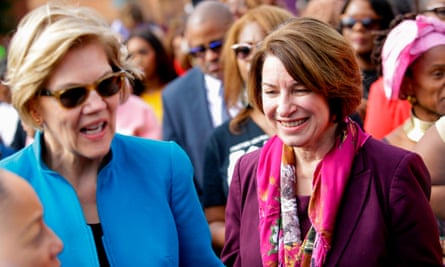 Warren and Amy Klobuchar greet people before marching in the annual Bloody Sunday March across the Edmund Pettus Bridge in Selma, Alabama, on 1 March.
