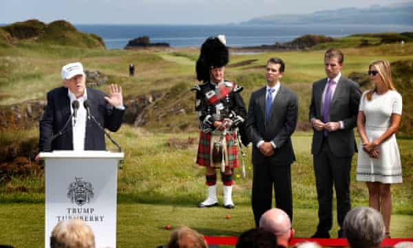 Eric, Donald and Ivanka Trump listen to their father Donald at the Grand Opening of Trump Turnberry last month.