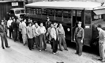 Men under arrest en route to court during the Los Angeles “zoot suit riots” in June 1943