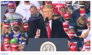 MAGA masks at Trump rally.