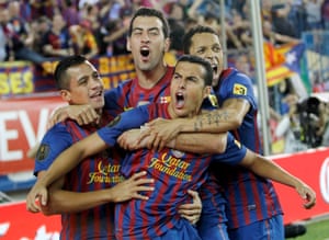 Pedro celebrates with Barcelona teammates after scoring during the Copa del Rey final win over Athletic Bilbao in May 2012.