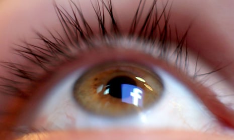 a facebook logo reflected in the human eye