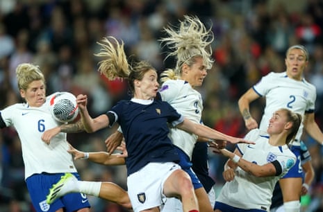 England's Rachel Daly (right) and Scotland's Erin Cuthbert battle for the ball.