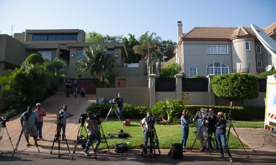 Television news crews outside Oscar Pistorius’ uncle’s house in Waterkloof, Pretoria.