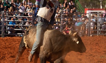 A Rookie Bull Rider takes his first ride, Alice Springs Rodeo, Northern Territory, Australia